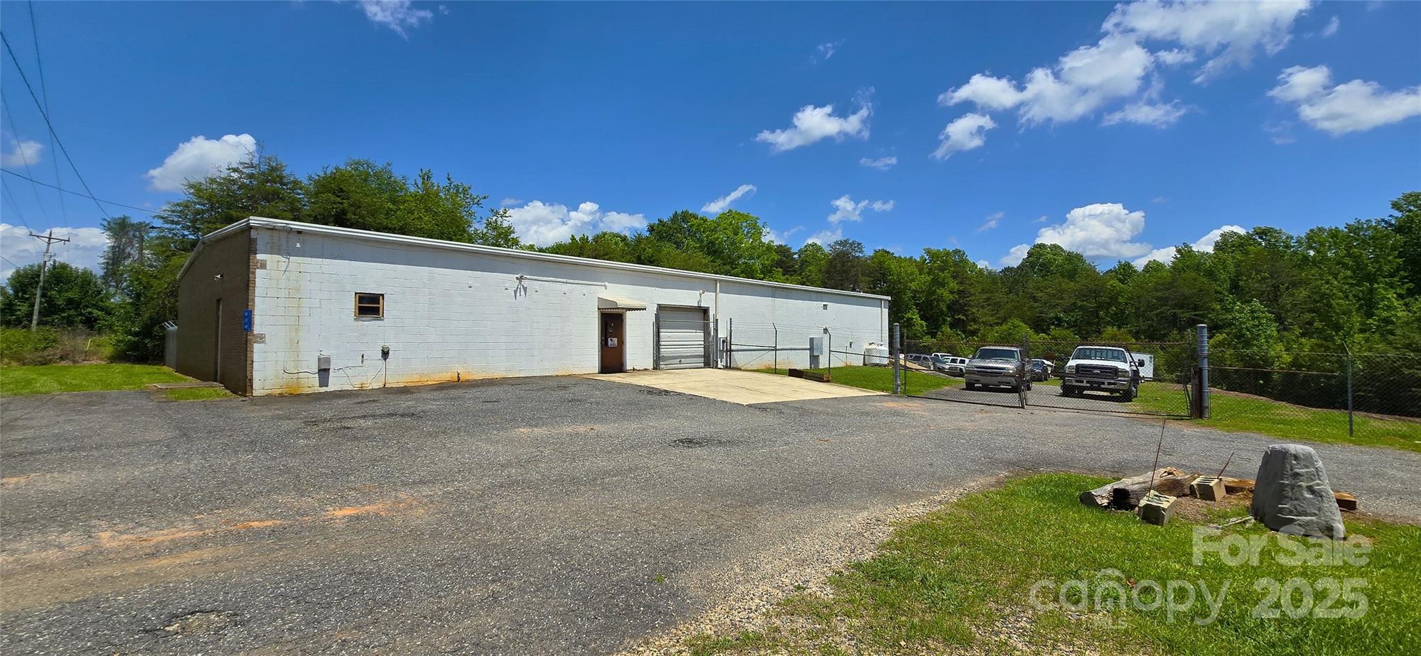 994 Rhyne Road Clover, SC 29710 - Photo 14 of 46 a view of a backyard with plants and a tree