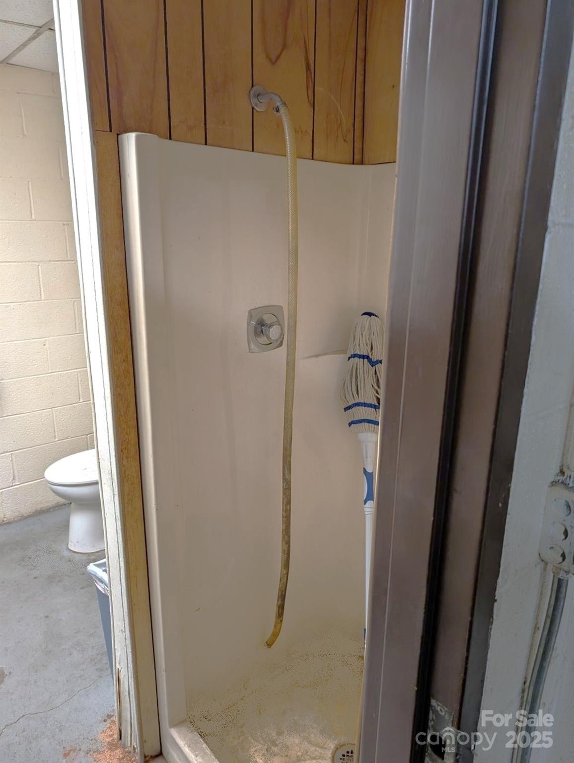 994 Rhyne Road Clover, SC 29710 - Photo 15 of 46 a bathroom with a granite countertop shower and a toilet