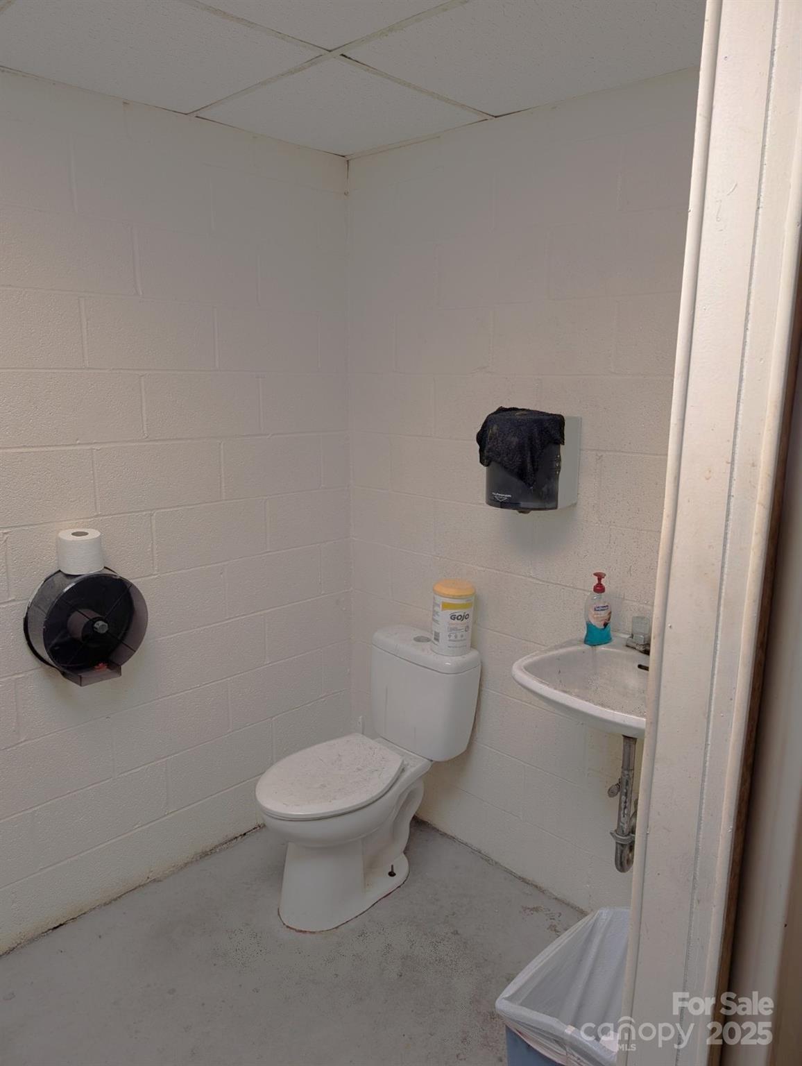 994 Rhyne Road Clover, SC 29710 - Photo 16 of 46 a bathroom with a toilet and a sink