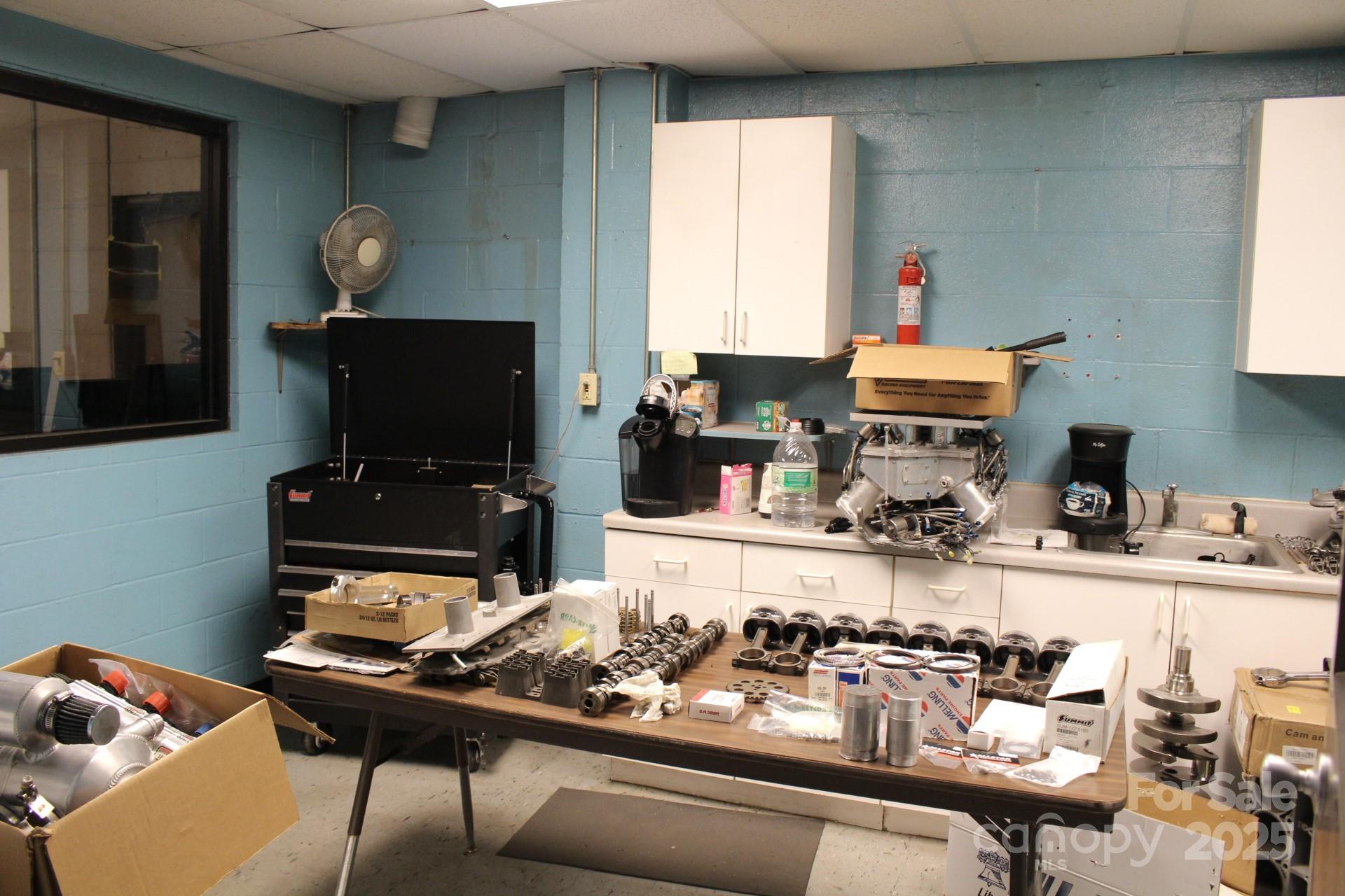 994 Rhyne Road Clover, SC 29710 - Photo 25 of 46 a kitchen with a stove a sink and a microwave