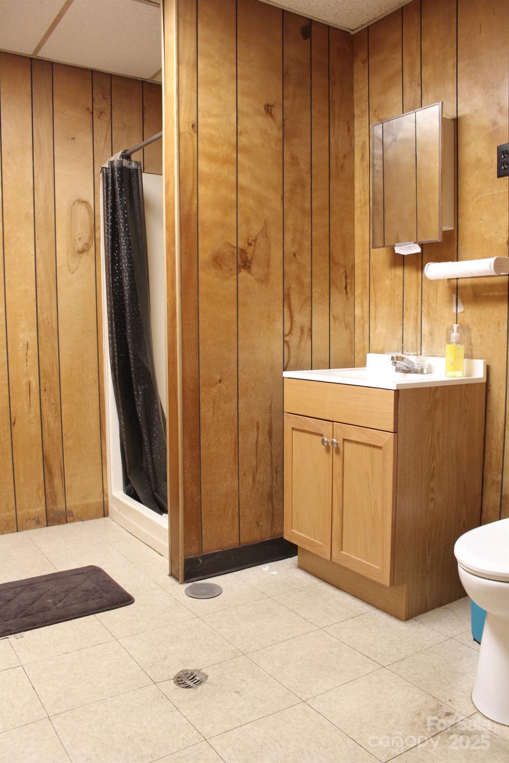 994 Rhyne Road Clover, SC 29710 - Photo 32 of 46 a bathroom with a sink and a mirror