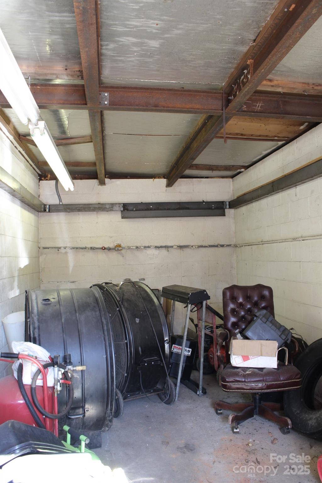 994 Rhyne Road Clover, SC 29710 - Photo 43 of 46 a view of a garage room with furniture