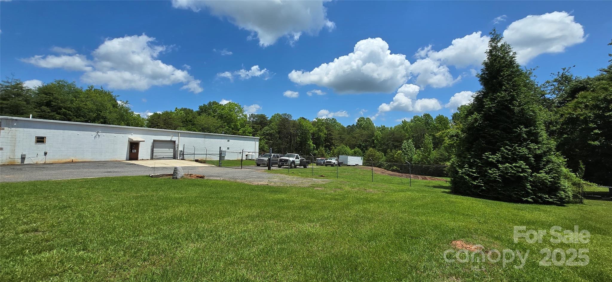 994 Rhyne Road Clover, SC 29710 - Photo 10 of 46 a view of a house with backyard and garden