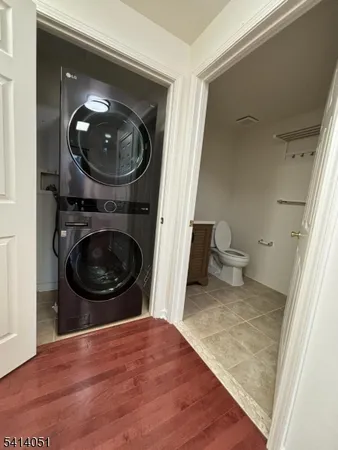 a view of a storage room with two washing machine and a shower