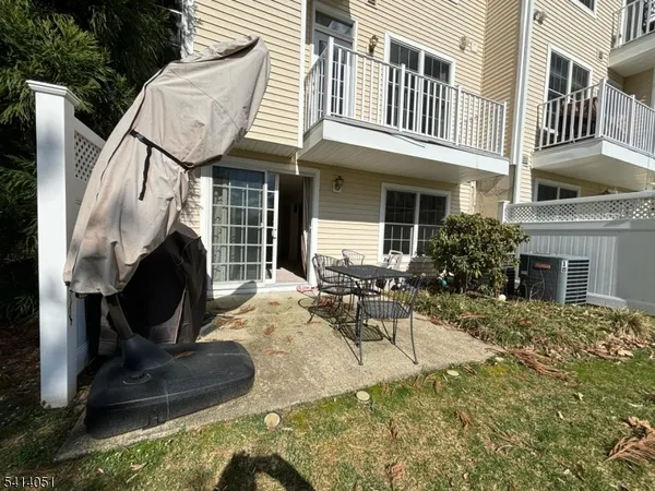 a bathroom with a shower and a mirror