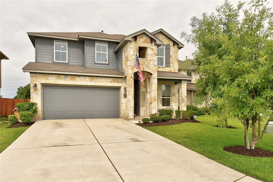 11700 Harpster Bend Austin, TX 78717 - Photo 1 of 1 front view of a house with a yard