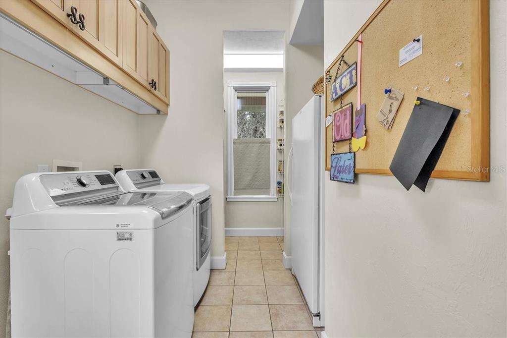 3850 Acline Road Punta Gorda, FL 33950 - Photo 15 of 50 a utility room with dryer and washer