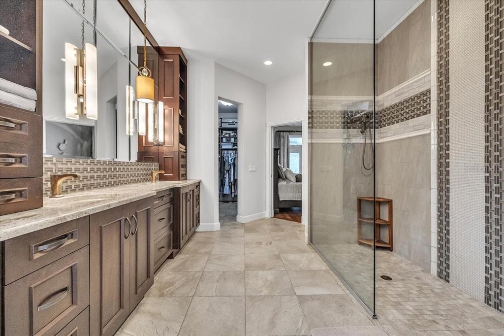 3850 Acline Road Punta Gorda, FL 33950 - Photo 20 of 50 a large kitchen with a granite countertop sink and a refrigerator