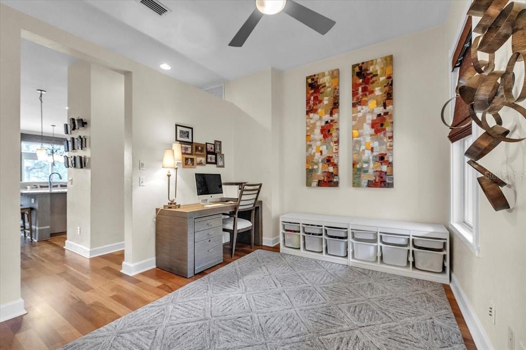 3850 Acline Road Punta Gorda, FL 33950 - Photo 22 of 50 a view of a kitchen with furniture and wooden floor