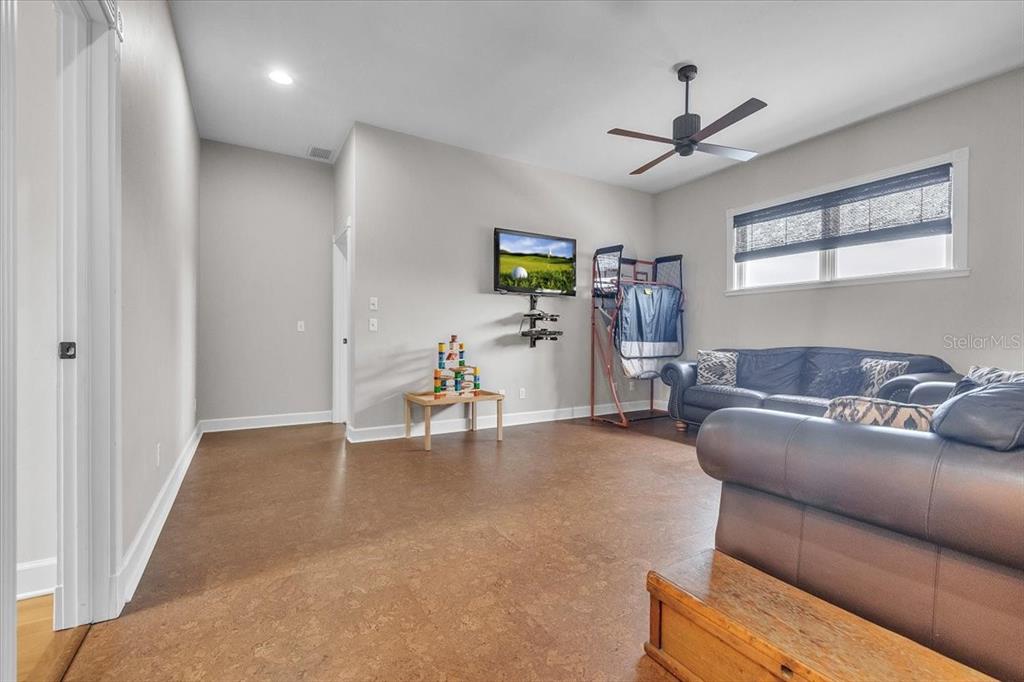 3850 Acline Road Punta Gorda, FL 33950 - Photo 27 of 50 a living room with furniture and a wooden floor