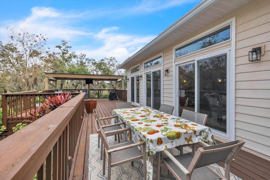 3850 Acline Road Punta Gorda, FL 33950 - Photo 39 of 50 a balcony with table and chairs
