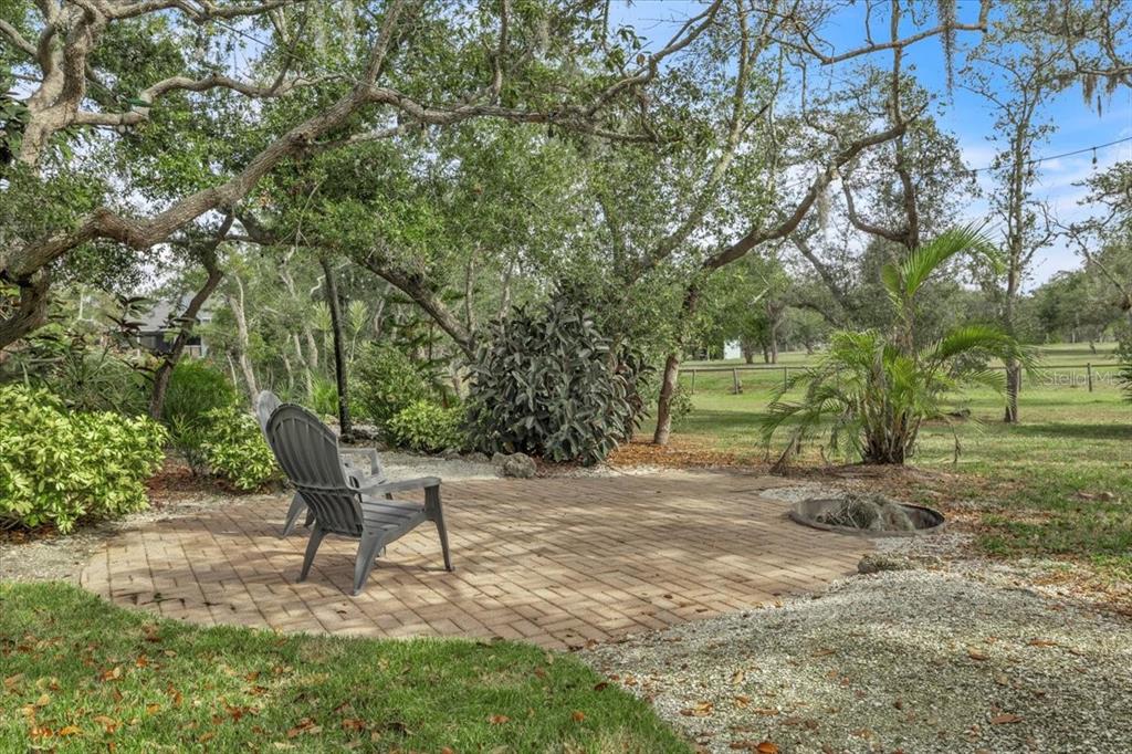 3850 Acline Road Punta Gorda, FL 33950 - Photo 43 of 50 a view of a backyard with chairs
