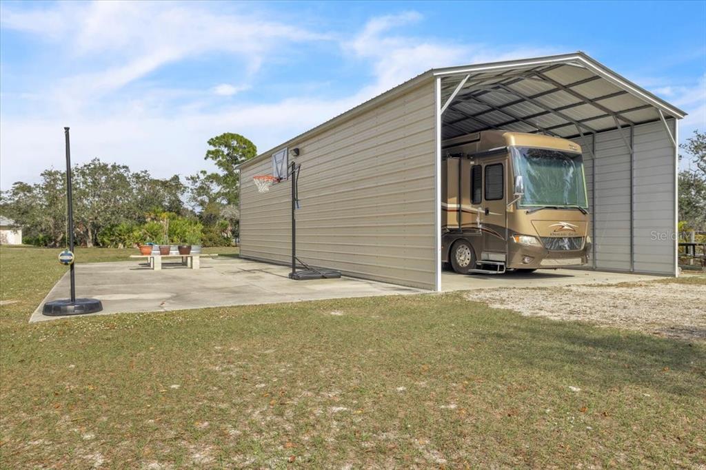 3850 Acline Road Punta Gorda, FL 33950 - Photo 50 of 50 a view of a house with backyard