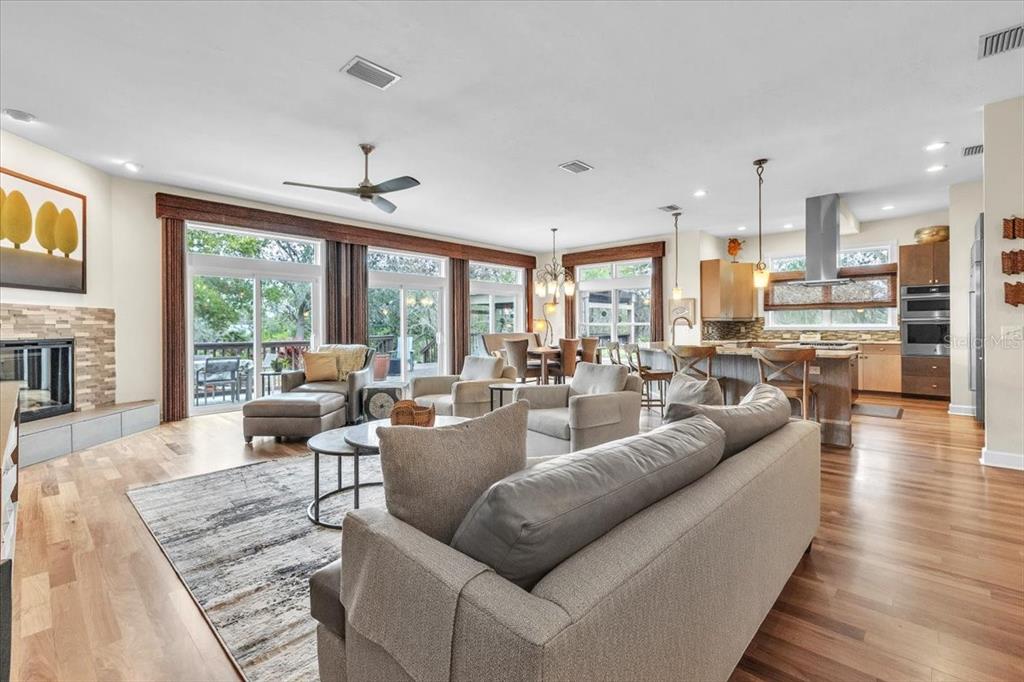 3850 Acline Road Punta Gorda, FL 33950 - Photo 6 of 50 a living room with furniture wooden floor and a large window