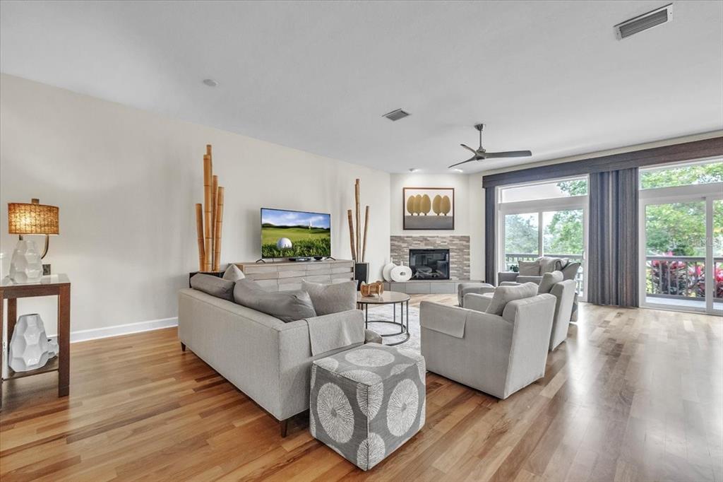 3850 Acline Road Punta Gorda, FL 33950 - Photo 7 of 50 a living room with furniture and a fireplace