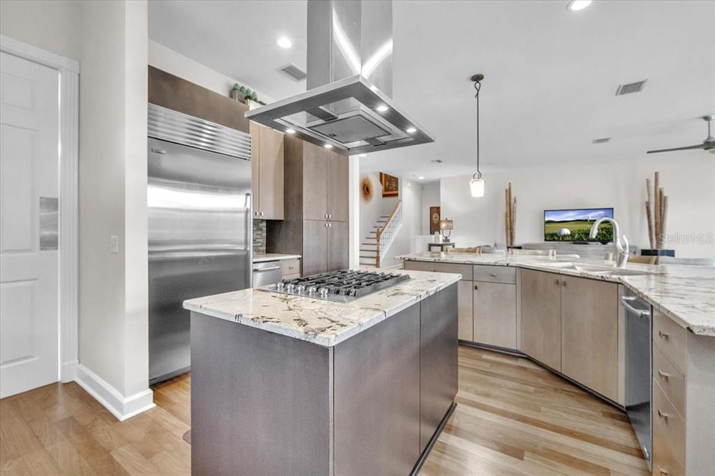 3850 Acline Road Punta Gorda, FL 33950 - Photo 10 of 50 a kitchen with stainless steel appliances granite countertop a sink and a refrigerator