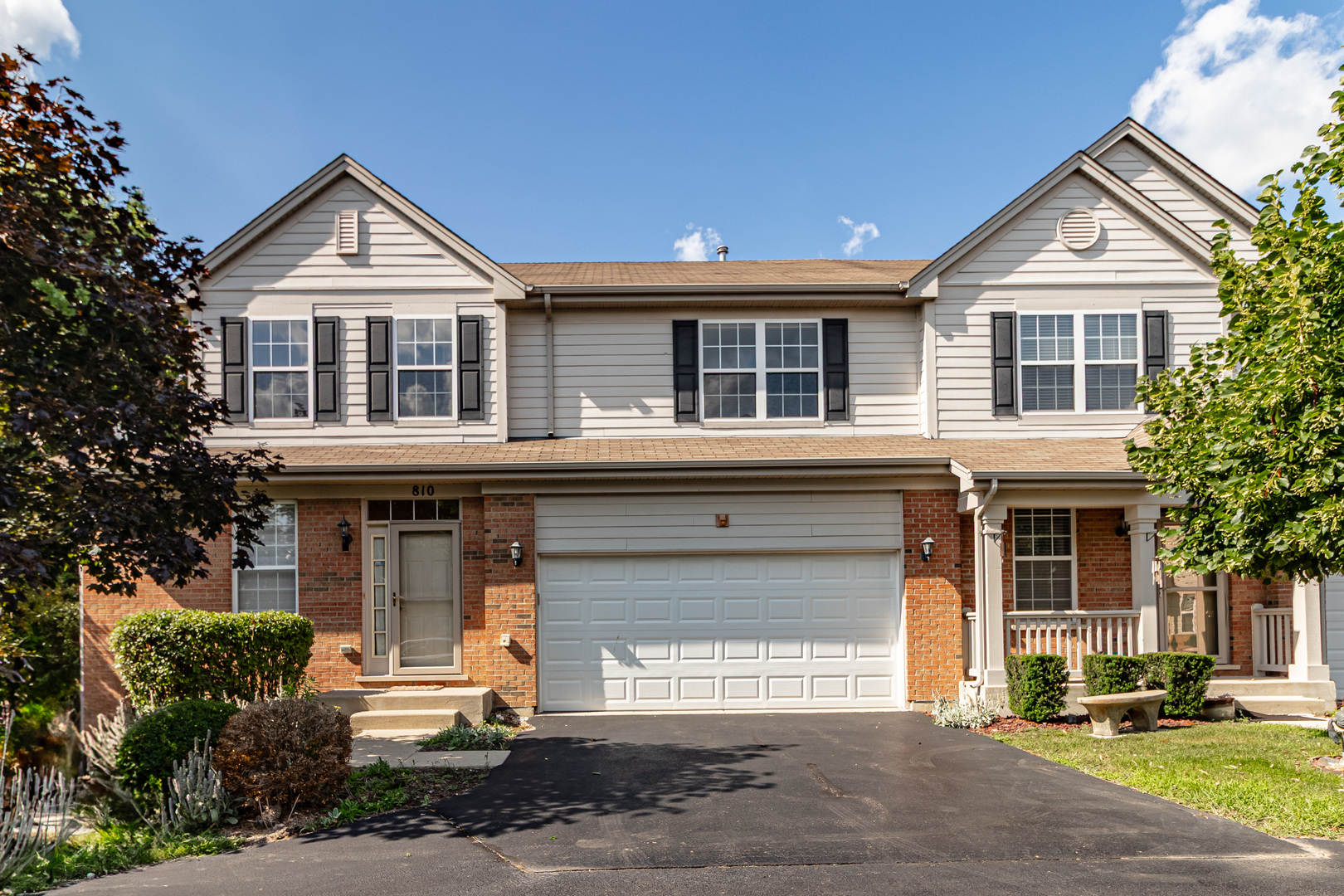 810 Spencer Lane Lake Zurich, IL 60047 - Photo 1 of 1 a front view of a house with a yard