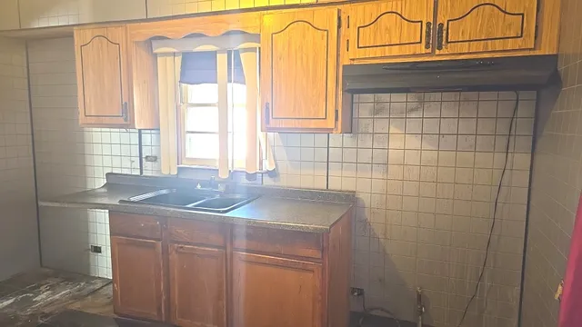 $39,900 | 14609 Lexington Avenue, Harvey, IL 60426