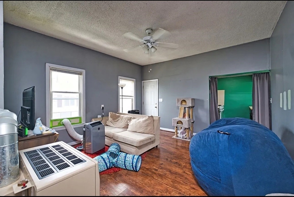 101 Cory Street, Unit 3 Fall River, MA 02720 - Photo 3 of 10 a living room with furniture and a window