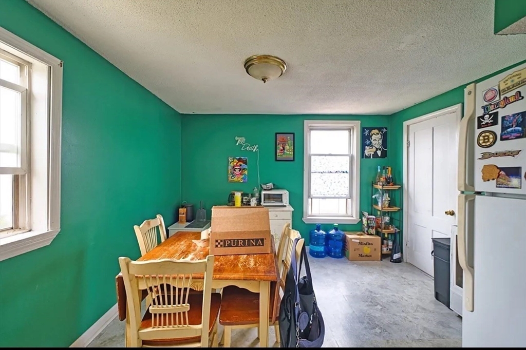 101 Cory Street, Unit 3 Fall River, MA 02720 - Photo 9 of 10 a dining room with furniture and window