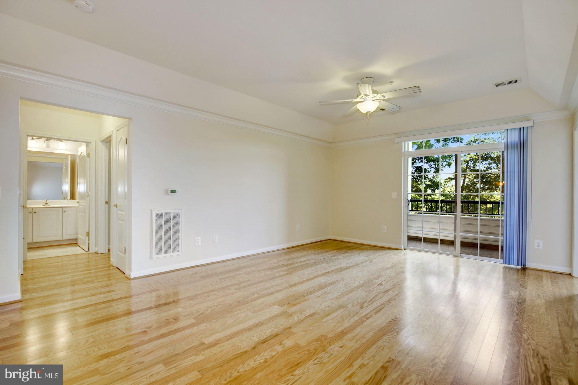 7305 Brookview Road, Unit 304 Elkridge, MD 21075 - Photo 13 of 45 Sliding Glass Door to Balcony