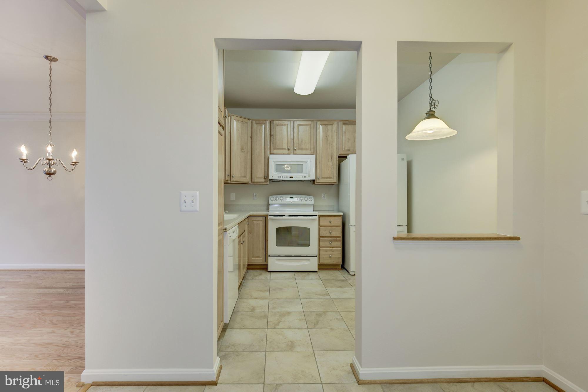 7305 Brookview Road, Unit 304 Elkridge, MD 21075 - Photo 6 of 45 Entry Foyer opens into Eat-in Kitchen