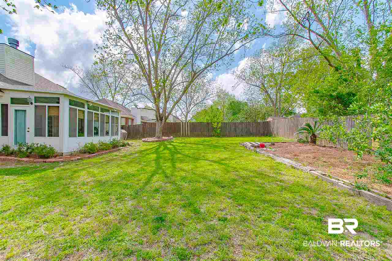 9211 Huckleberry Drive Daphne, AL 36527 - Photo 32 of 35 Fenced Back Yard