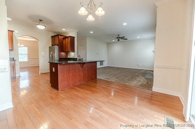 a view of a kitchen with a sink