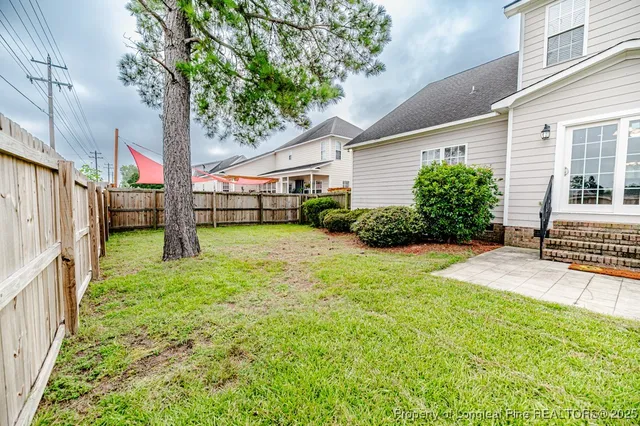a front view of a house with a yard and porch