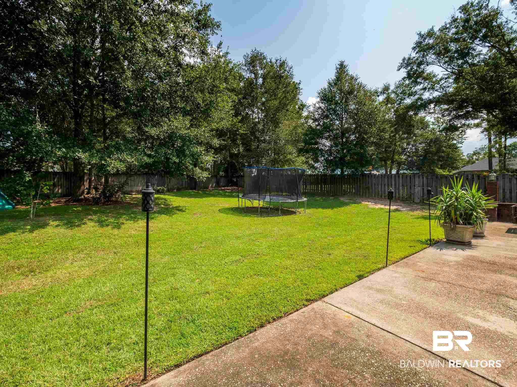 11559 Maple Court Daphne, AL 36526 - Photo 33 of 48 Patio to Backyard