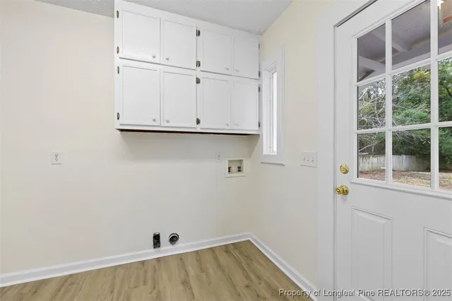 a view of walk in closet with window