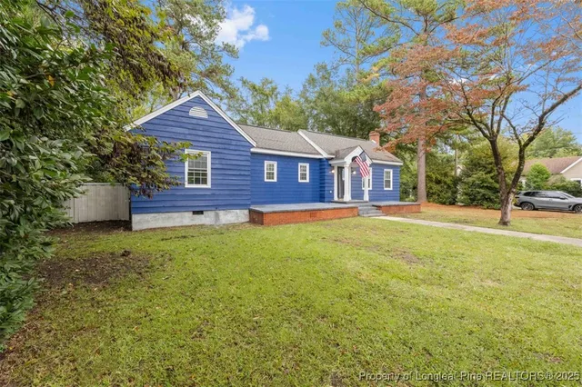a view of outdoor space yard and front view of a house