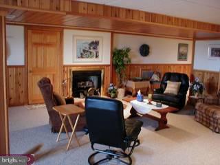 994 Fallowfield Road Atglen, PA 19310 - Photo 3 of 6 a living room with furniture and a fireplace