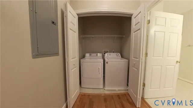 a bathroom with a tub and shower