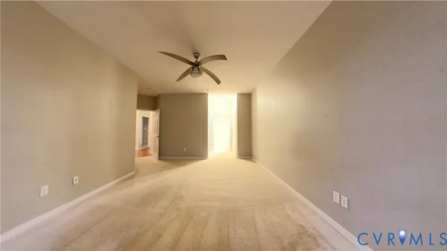 a bathroom with a granite countertop sink mirror bathtub and toilet