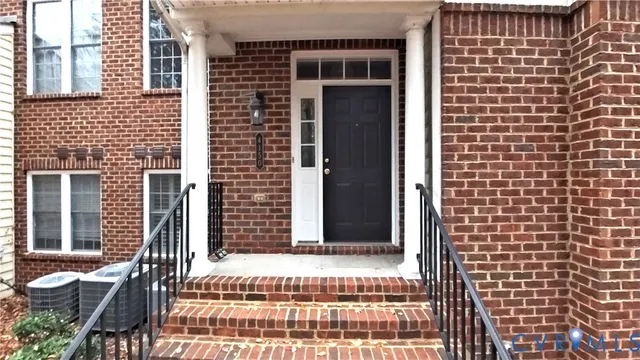 a view of a brick wall of the building