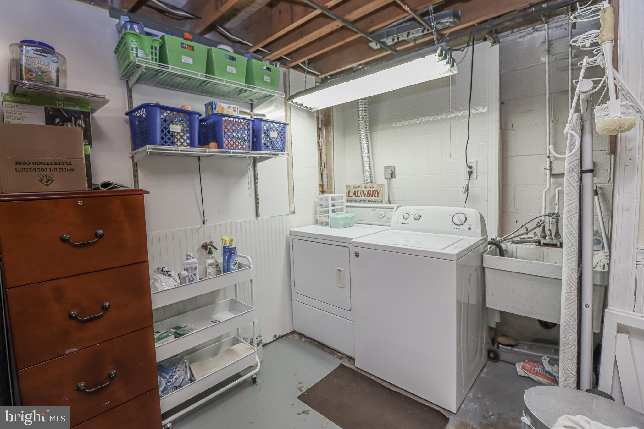 9515 Burdett Road Burke, VA 22015 - Photo 26 of 34 Laundry room & lots of storage space!