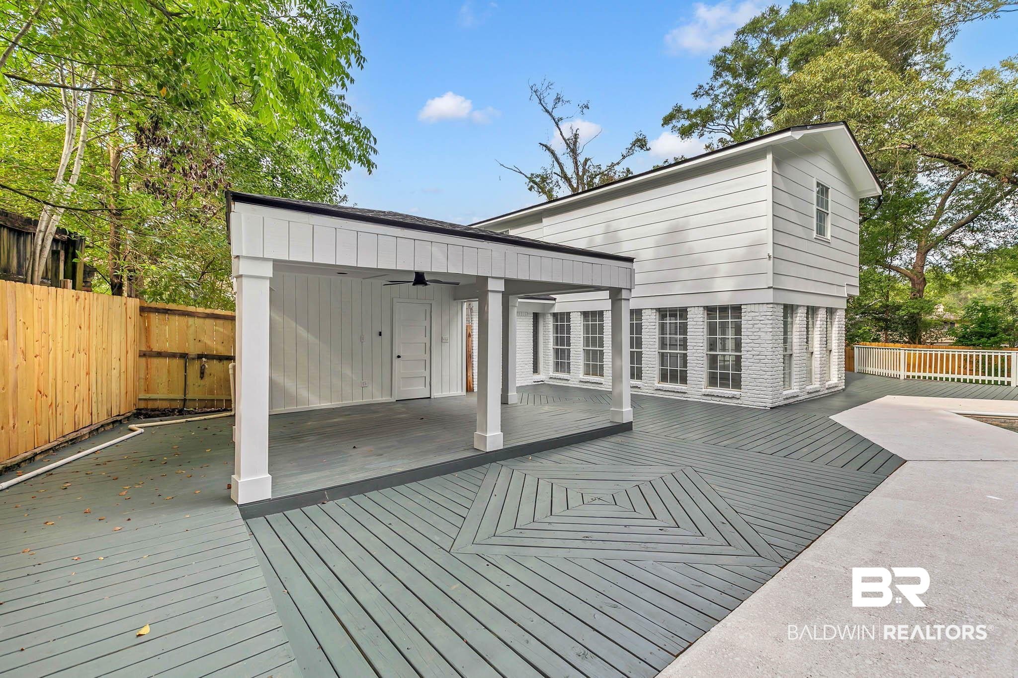 4705 Sherry Court Mobile, AL 36693 - Photo 67 of 100 Back of house with a deck and a ceiling fan