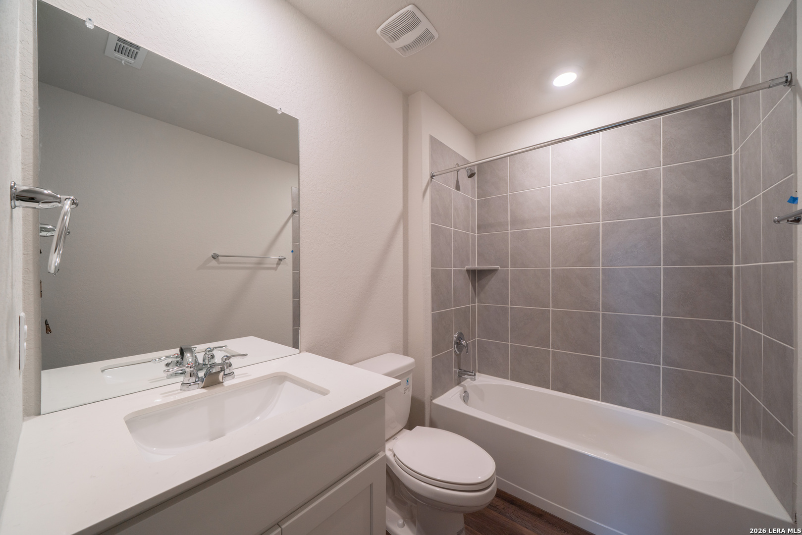 14674 Clay Rdg Run San Antonio, TX 78253 - Photo 11 of 14 a bathroom with a sink a toilet and bathtub