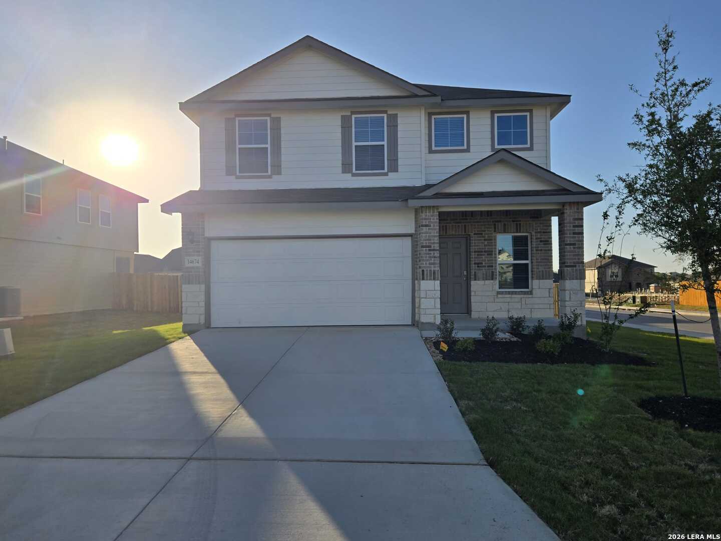 14674 Clay Rdg Run San Antonio, TX 78253 - Photo 2 of 14 a front view of a house with garden