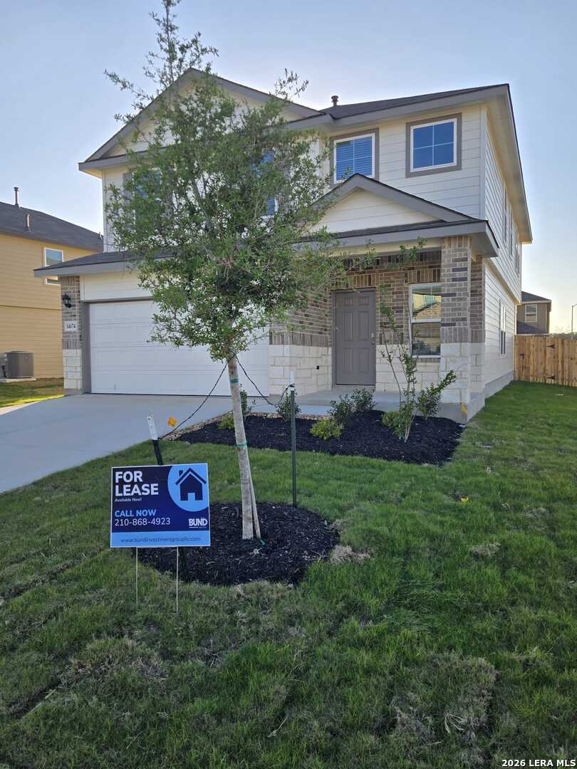 14674 Clay Rdg Run San Antonio, TX 78253 - Photo 3 of 14 a view of a house with a yard