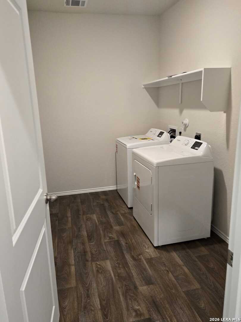 14674 Clay Rdg Run San Antonio, TX 78253 - Photo 6 of 14 a utility room with dryer and washer