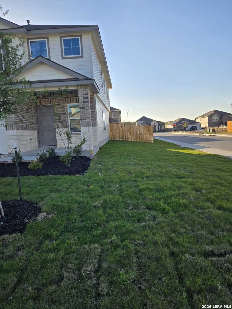 14674 Clay Rdg Run San Antonio, TX 78253 - Photo 8 of 14 a front view of a house with a yard
