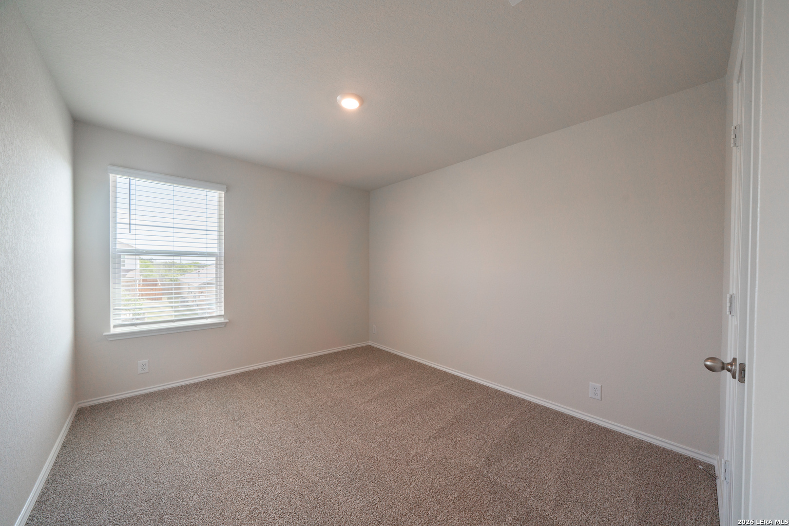 14674 Clay Rdg Run San Antonio, TX 78253 - Photo 9 of 14 an empty room with a window