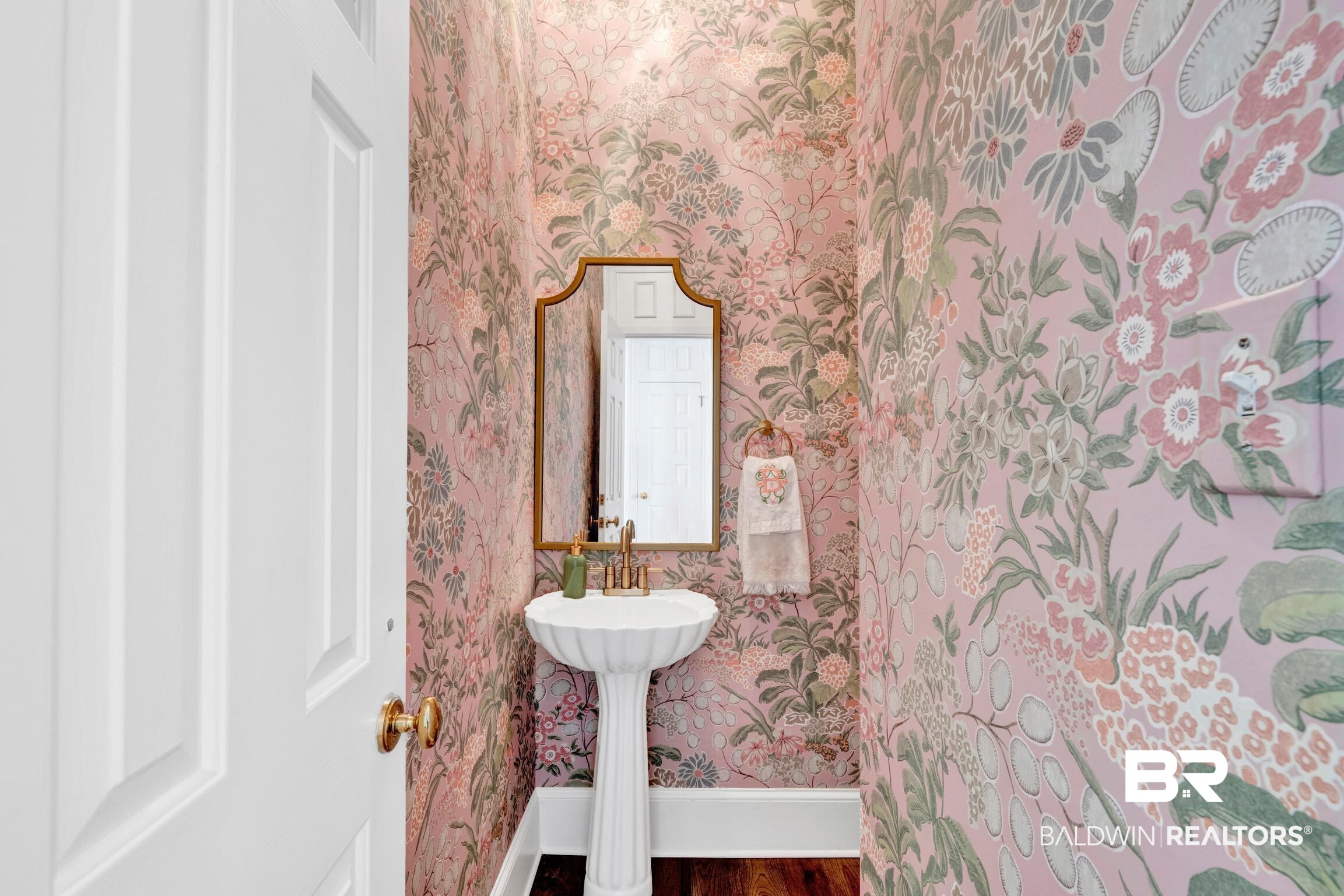4 Savannah Court Mobile, AL 36608 - Photo 26 of 32 Half bath with wallpapered walls and wood finished floors