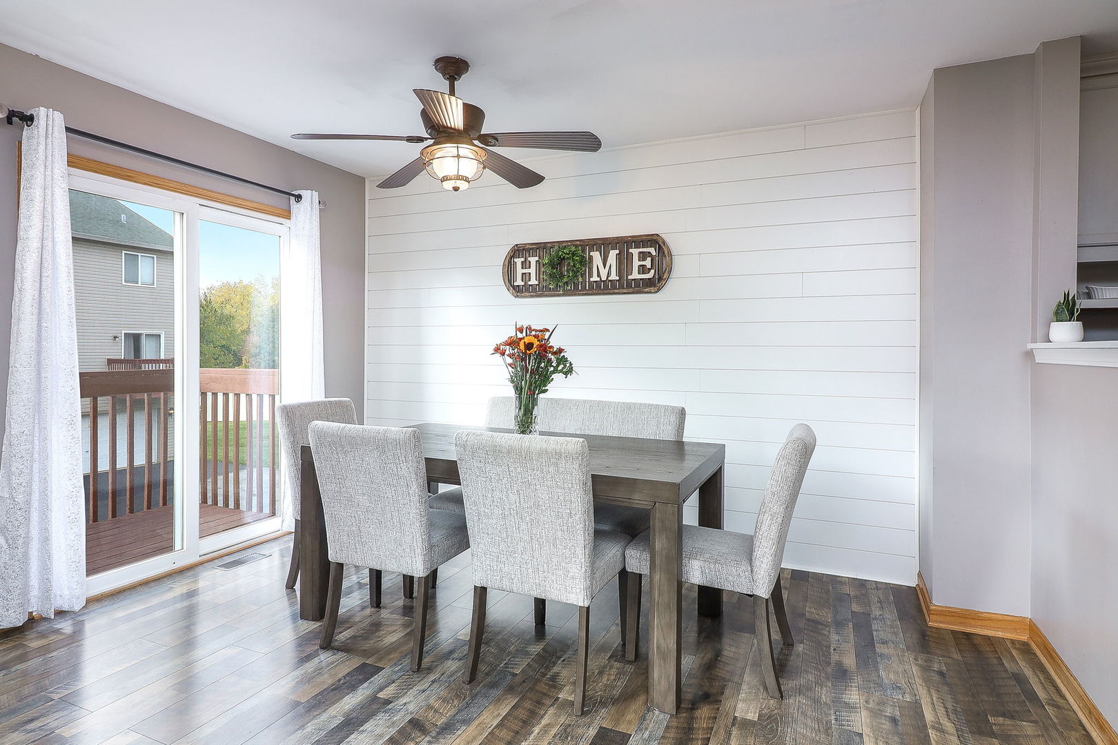 1914 Austrian Pine Street Lockport, IL 60441 - Photo 6 of 17 a view of a dining room with furniture and wooden floor