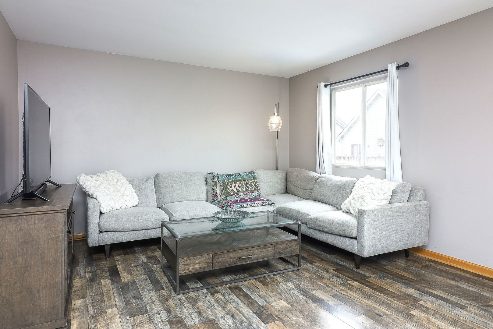 1914 Austrian Pine Street Lockport, IL 60441 - Photo 8 of 17 a living room with furniture and a flat screen tv