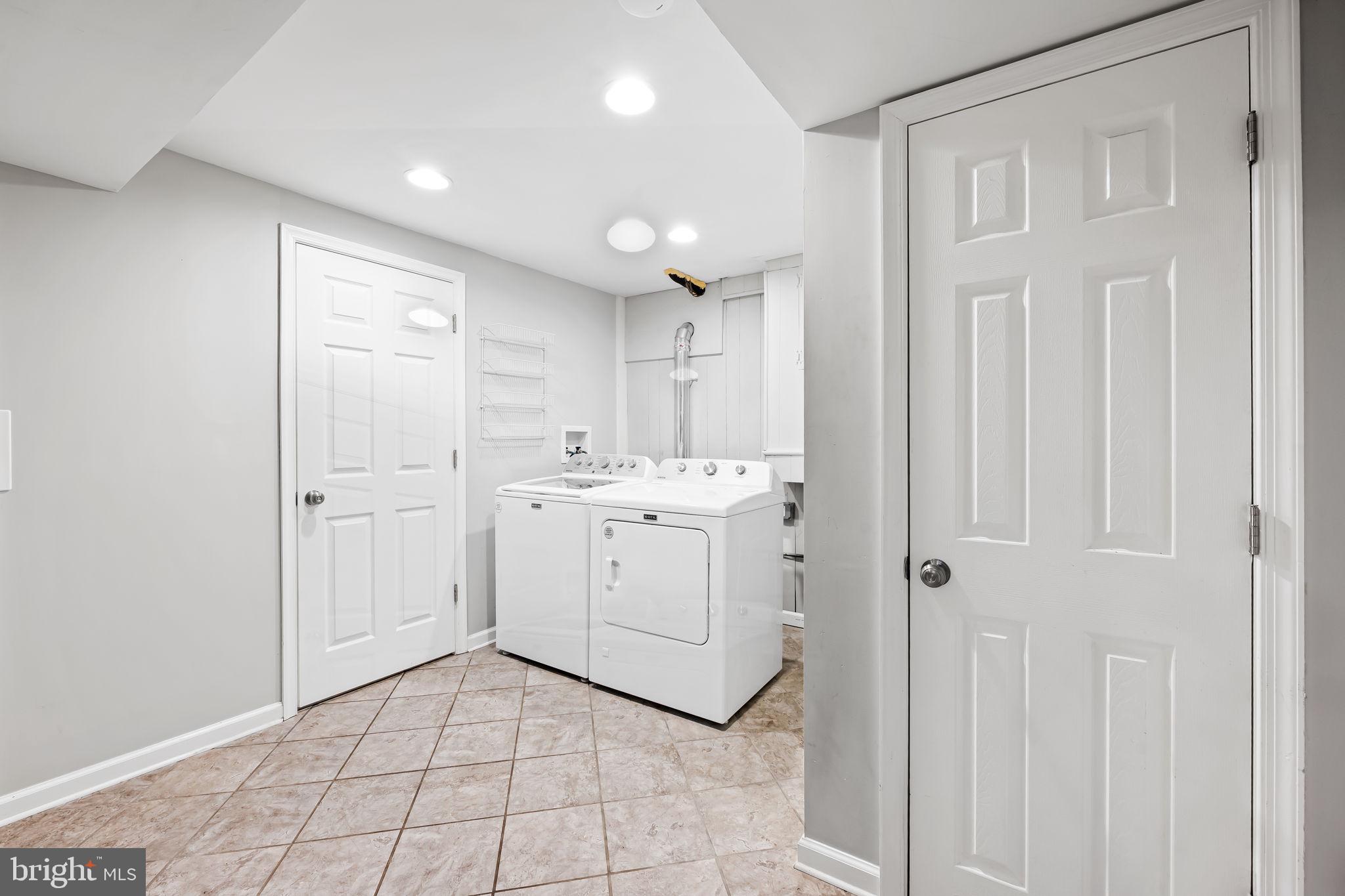 1817 Dunmere Road Baltimore, MD 21222 - Photo 23 of 27 a bathroom with a sink a toilet and shower
