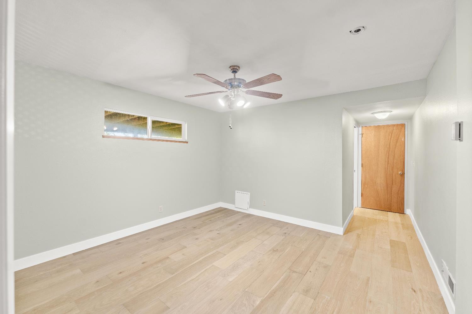 18330 Hummingbird Drive Penn Valley, CA 95946 - Photo 35 of 62 a view of an empty room with chandelier fan