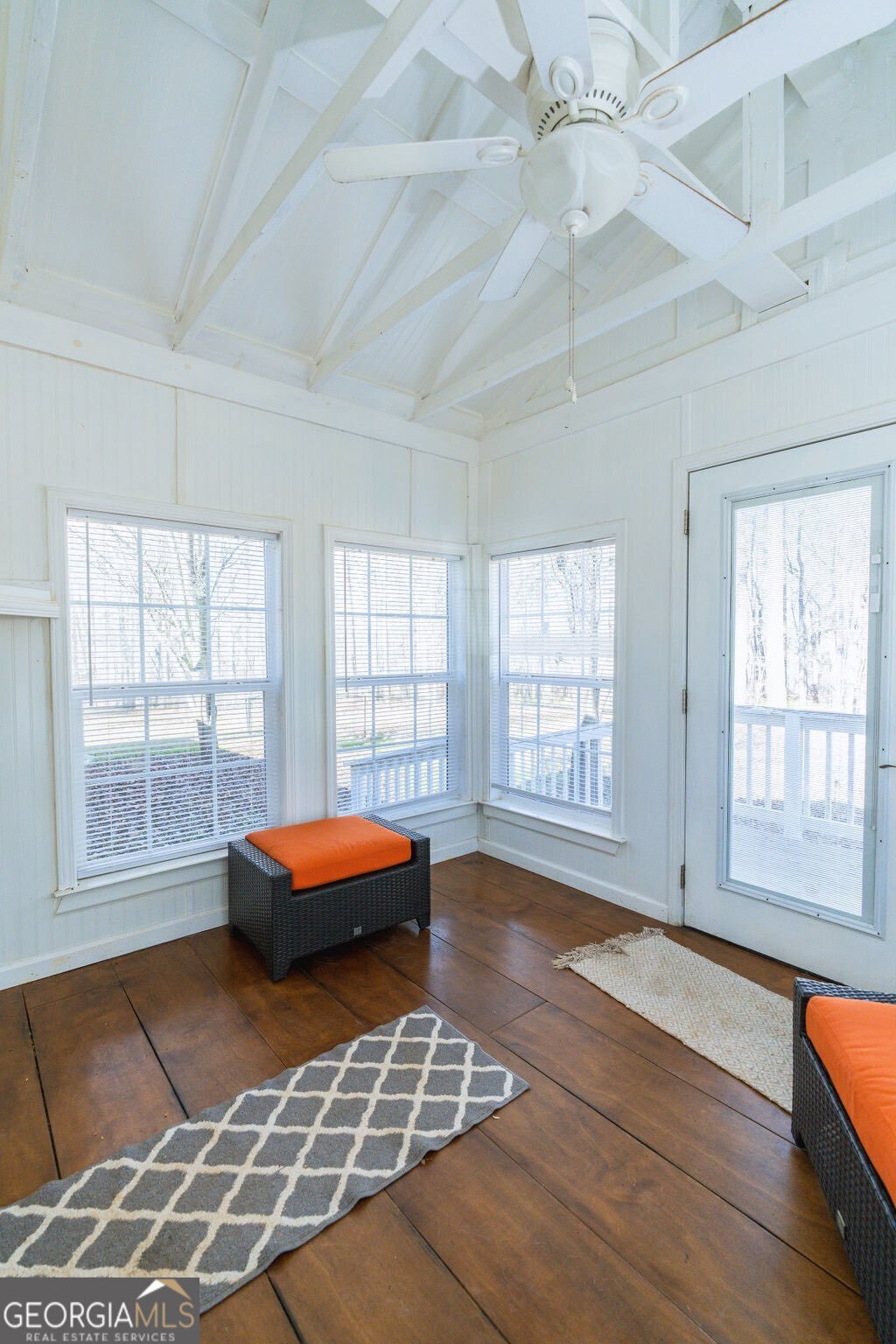 211 Sunfish Trail Southwest Eatonton, GA 31024 - Photo 20 of 40 a living room with a large bed and a window